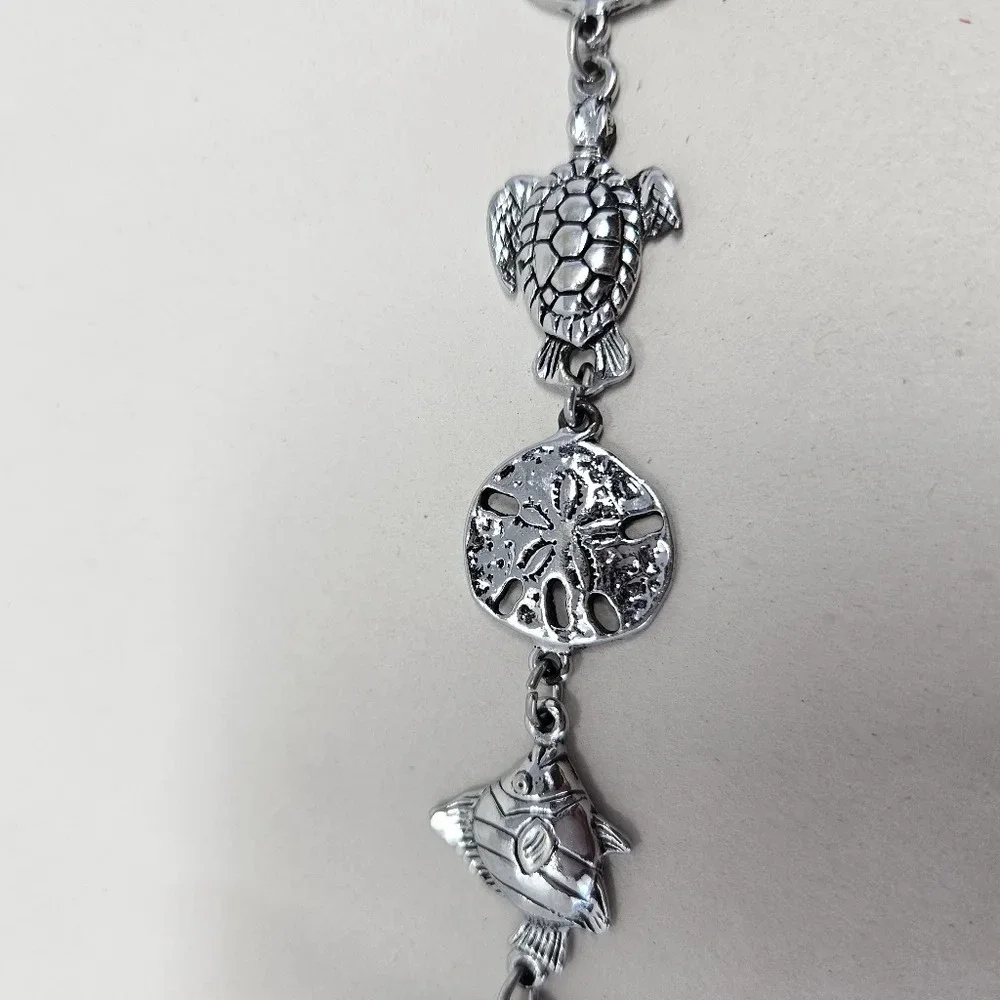 Sea life wrist bracelet Silver Tone Sea Turtle Sand Dollar Fish 7 In. Dolphin